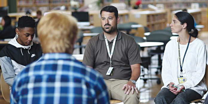 Andrew Nalepa School Psychologist at Skyline High School and TRAILS co-founder Elizabeth Koschmann PhD during a student CBT and Mindfulness group.