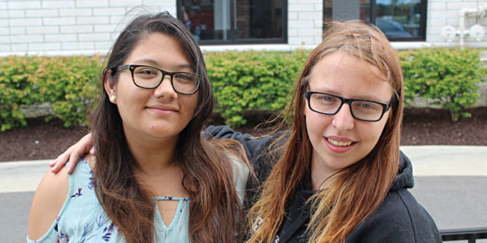 Annika Hockman (L), 16, host sister, with Christine Devriel (R), 17, exchange student from Germany. The two lived and learned together for an entire school year.