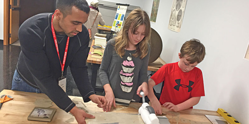 Families can participate in various art and science classes. Photo credit - AADL.