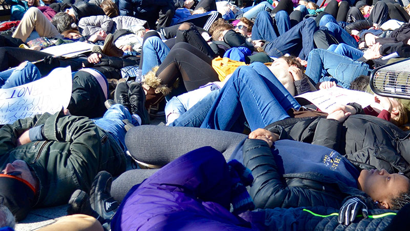 Students lay down in Liberty Plaza. Photo: Karen Smyte