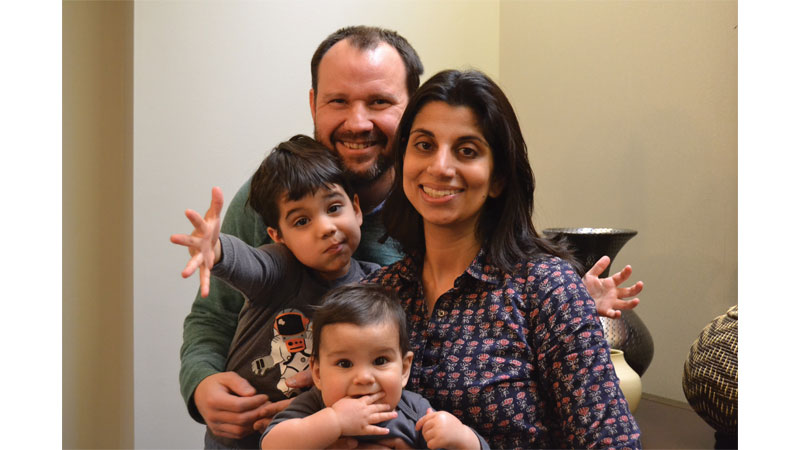 Sharira Daya, and her husband Andy Newman with their two sons, Shane Ali, 5, and Oskar, 10 months. Photo Credit: Mary Ann Buckley