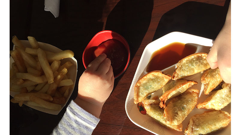 Dumpling appetizer with fries