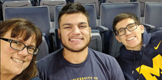 Sandy Goetz and her teen sons, Parker (L) and Jarad (R).