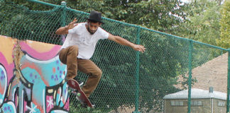 Ypsilanti skater enthusiast Cory Spivey goes airborne while trying out some new moves at Prospect Park in Ypsilanti.