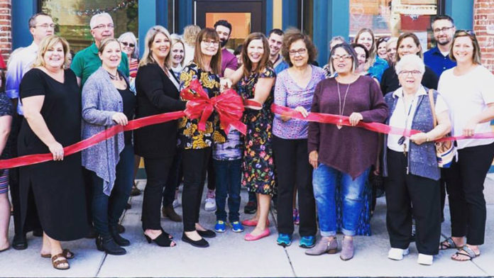Textiles Fabric Shop ribbon cutting