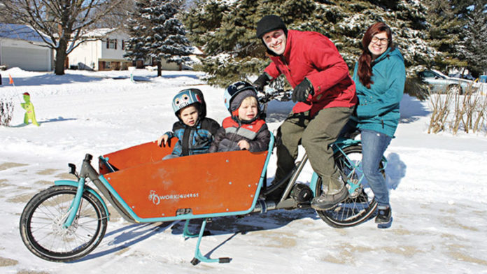 Angela and Jarin Marocco get out in the snow on their cargo bike with their children Dominic, 4, and Aurelio, 2.