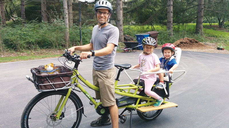 Sam Firke with two of his children, Ilana, 10, and Ari, 4. 