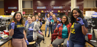 With the assistance of volunteers from the Society of Advancement of Hispanics/Chicanos and Native Americans in Science (SACNAS) University of Michigan Chapter, 4th-6th graders performed DNA extraction of strawberries.