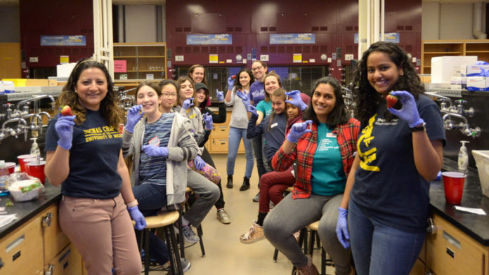 With the assistance of volunteers from the Society of Advancement of Hispanics/Chicanos and Native Americans in Science (SACNAS) University of Michigan Chapter, 4th-6th graders performed DNA extraction of strawberries.
