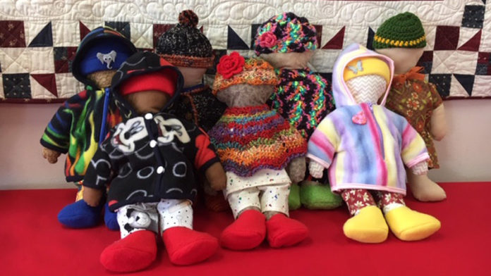 Dolls ready to be delivered to young patients at C.S. Mott Children’s Hospital donated by The Quilting Season in Saline