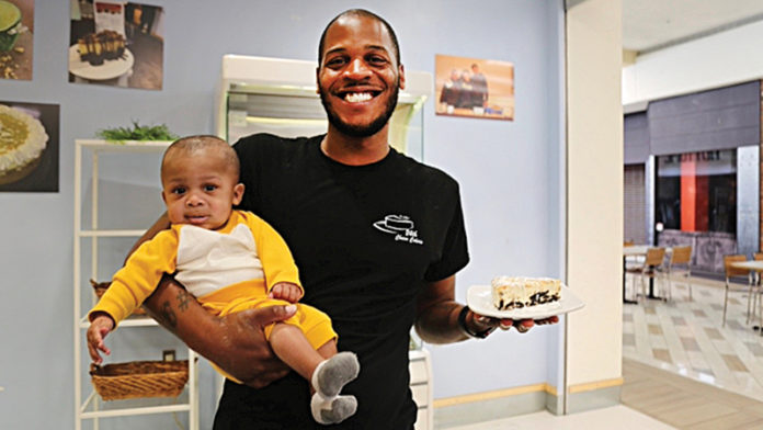 Sean Brezzell both welcomed his son, Sean, and opened his new cheesecake store, 24th Cheesecakerie, earlier this year. photo by Maddie Dietrich