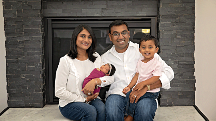 Primrose School of Canton Franchise Owners Kunjan (L) & Hemal (R) Patel pose with their 2-year-old son & newborn daughter.