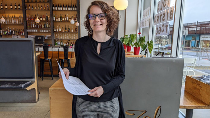 (Contributed by Amber Messman): Zola Bistro Manager Amber Messman is one of many in the restaurant business balancing new restrictions with getting meals to her customers. She is also a parent managing the new online school reality with her two high schoolers.