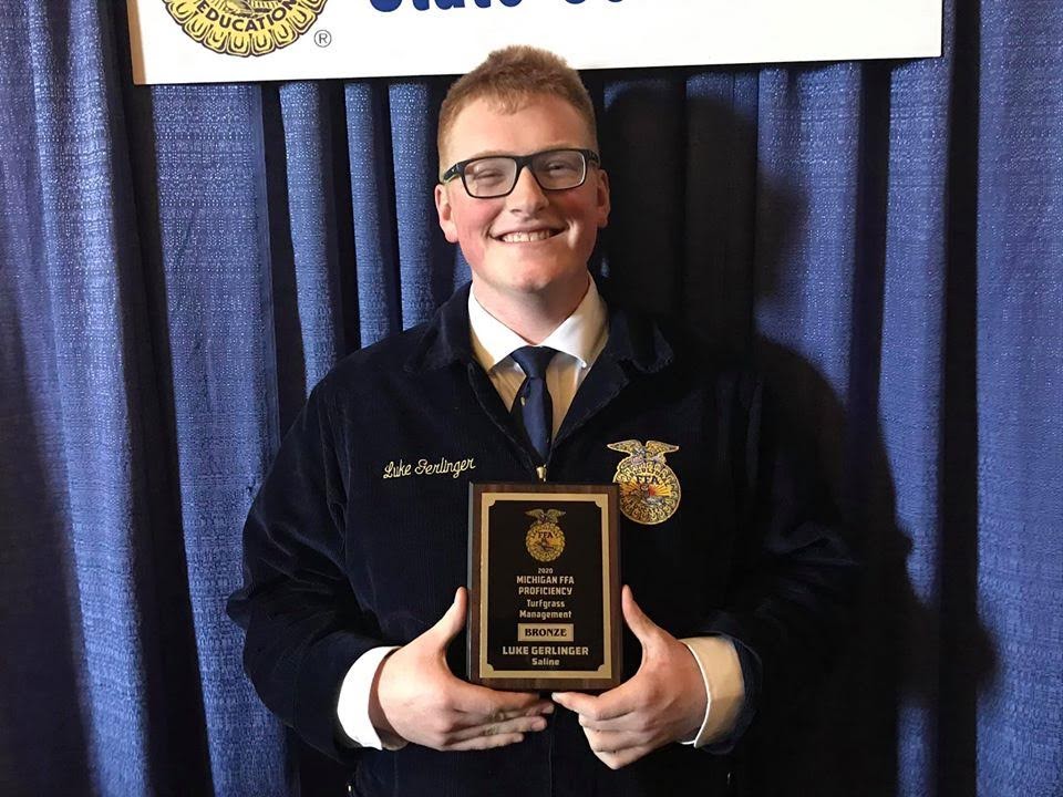 Saline High School student Luke Gerlinger, 17, received the 2020 Michigan FFA State Bronze Proficiency Award for Turfgrass Management at a ceremony at Michigan State University in March. Image courtesy of David Mellor.