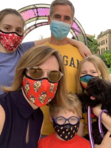 The Bixler family: Jill, Jon, Clara (13), Rowan (9), & Damian (5) with their “pandemic puppy,” Coco Bear (Coton de Tulear & Poodle mix called a PooTon, now 6 months old). Image courtesy of Jill Bixler.