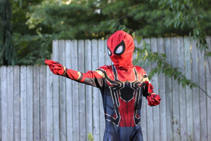 Child in spider man costume