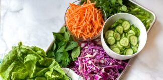 sheet pan with ingredients to assemble summer roll lettuce wraps