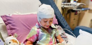 Young patient playing with iPads