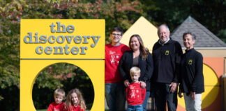 A group of people standing.