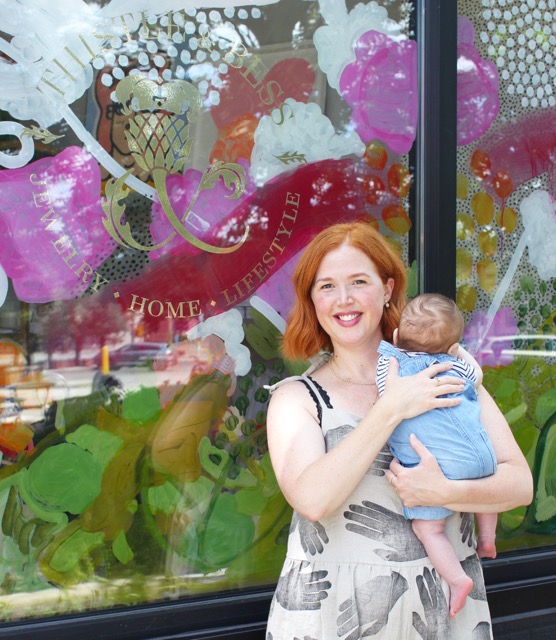 A parent holding their child.