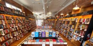 A photo of a selection of books in a library.