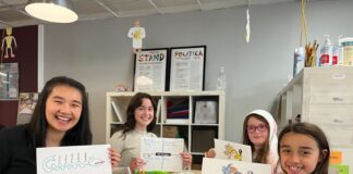 A adult doing activities with children.