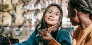 Two people working together.