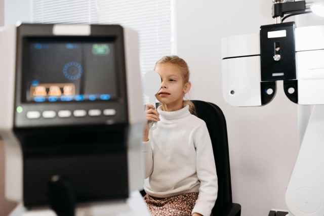 A child getting an eye exam.