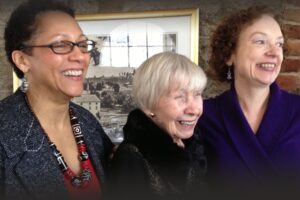 A group of people laughing together.