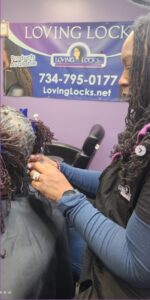 A customer getting a haircut.