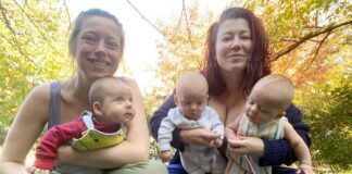 Women and babies smiling