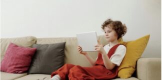 A child laying on a couch.