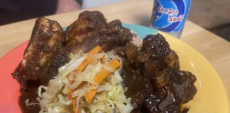 A plate of jamaican food.