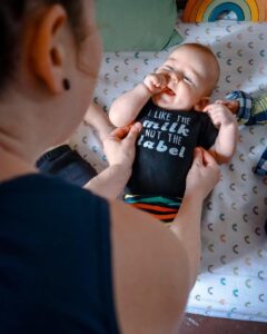 A parent holding their child.