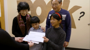 Kids and parents looking over results