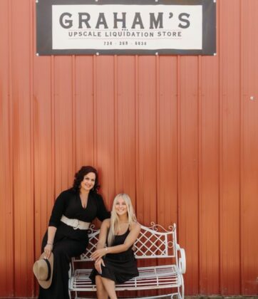 A parent sitting with their child.