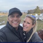 A couple taking a picture.