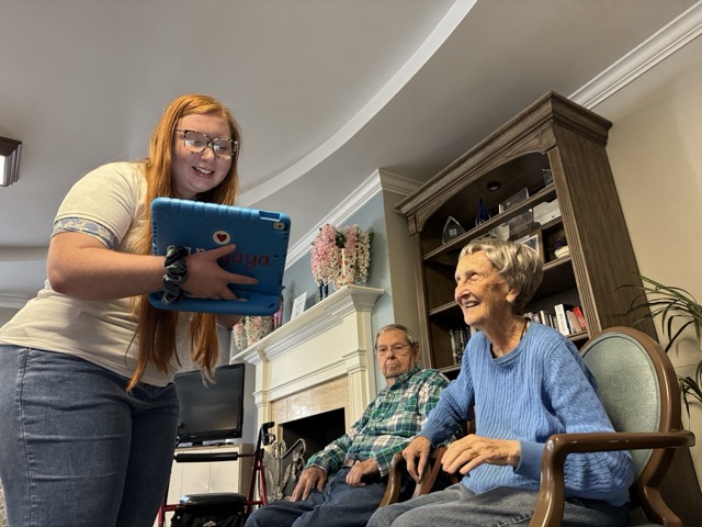 A group of people smiling.