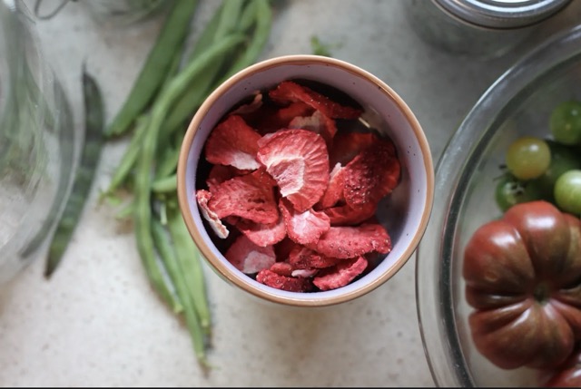 An Assortment of cut fruit on a table.