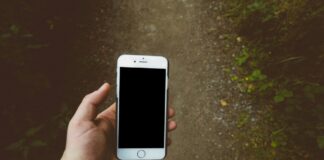 Someone holding a phone.