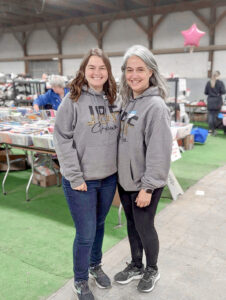 2 woman in gray sweatshirts