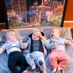 Three babies laying down
