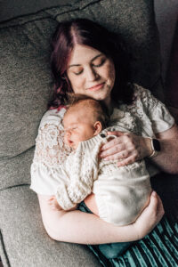 Photo of mother holding baby 