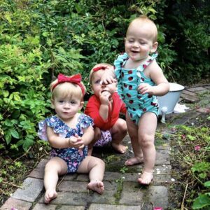 triplets in summer outfits