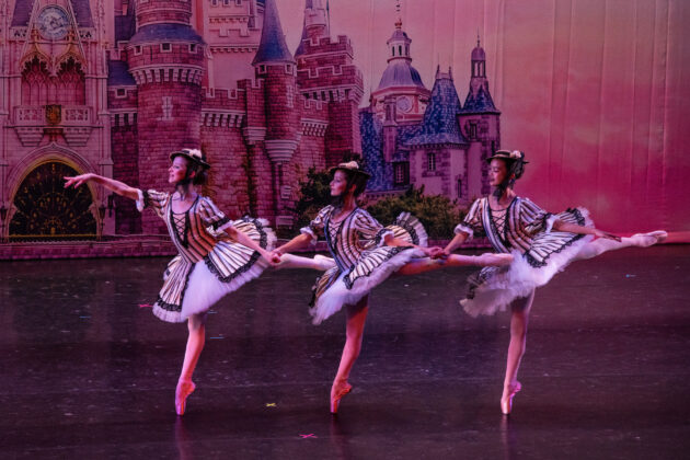 Three dancers on stage