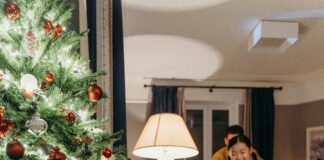 kid running to Christmas tree