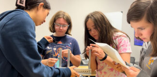 Children working with robotics