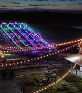 Glow tubing run lit up at night 