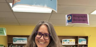 Woman in library with books