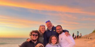 Gerald Vazquez and his family on the beach